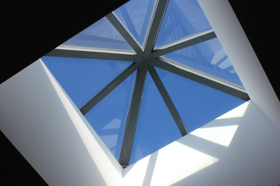 Modern glazed roof lantern with slim framing bringing natural daylight into a home